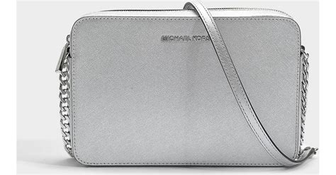 michael kors aluminum purse|silver crossbody bag designer.